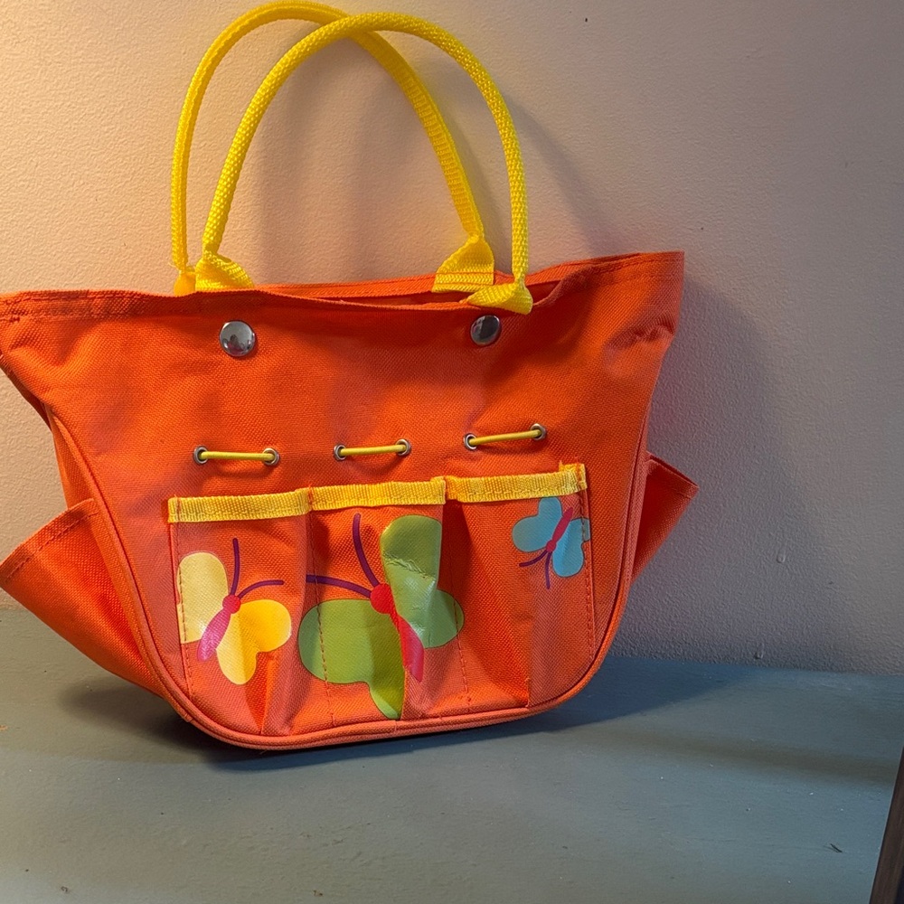 Bright Orange Canvas Tote with Yellow Handles and Butterfly Accents